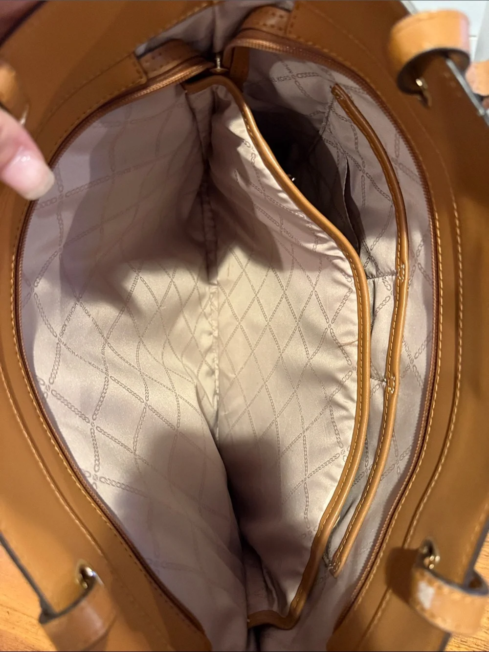 Michael Kors measures 14x16
